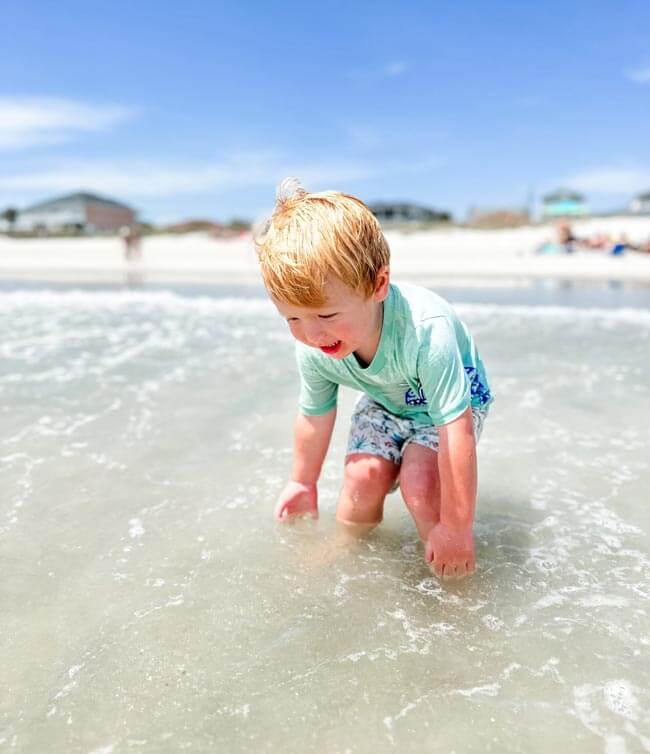 Child playing on the beach